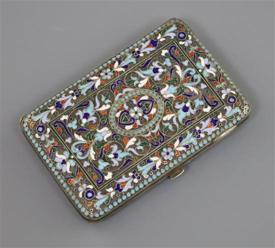 An early 20th century Russian 84 zolotnik silver and polychrome cloisonne enamel cigarette case, gross 180 grams.